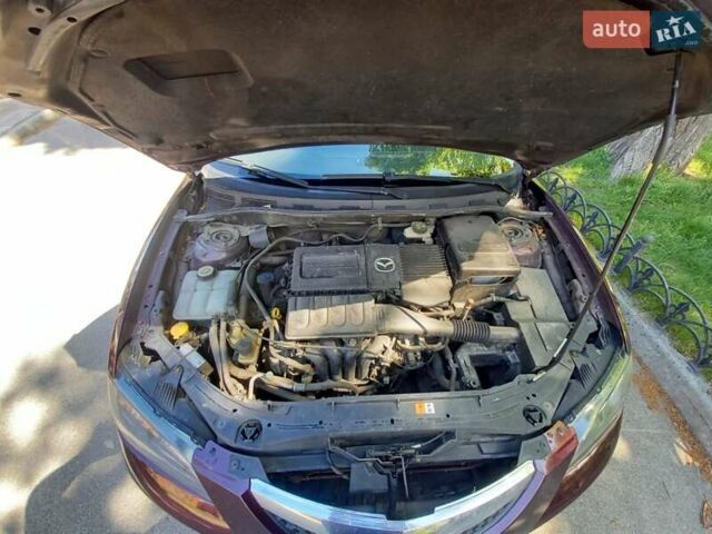 Мазда 3 2008 в Киеве на Automoto.ua Фиолетовый Мазда 3, объемом двигателя 1.6 л и пробегом 178 тыс. км за 5900 $, фото 12 на Automoto.ua