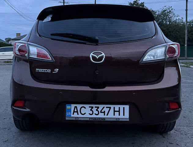 Коричневий Мазда 3, об'ємом двигуна 1.6 л та пробігом 235 тис. км за 7500 $, фото 3 на Automoto.ua