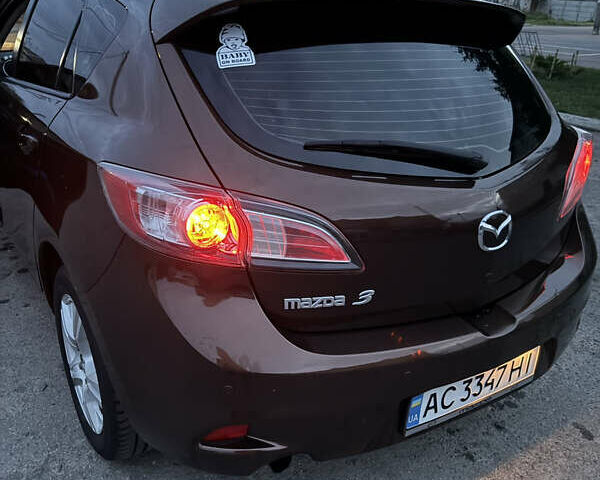 Коричневий Мазда 3, об'ємом двигуна 1.6 л та пробігом 235 тис. км за 7500 $, фото 7 на Automoto.ua