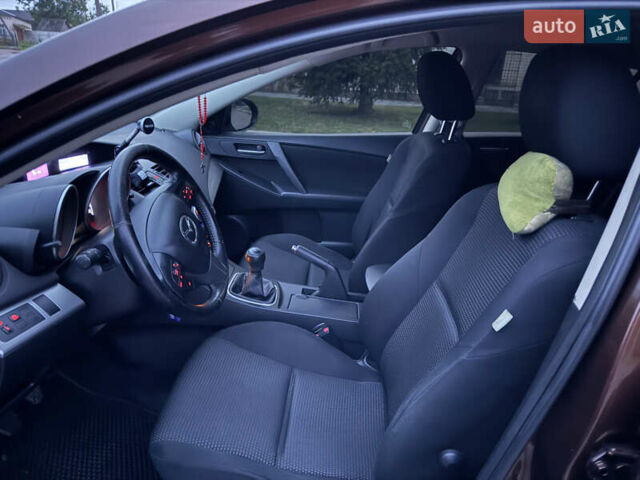 Коричневий Мазда 3, об'ємом двигуна 1.6 л та пробігом 235 тис. км за 7500 $, фото 15 на Automoto.ua
