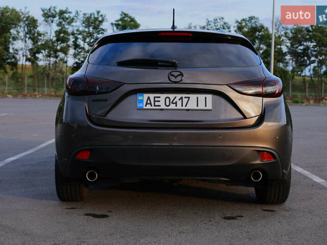 Коричневый Мазда 3, объемом двигателя 2 л и пробегом 196 тыс. км за 9000 $, фото 4 на Automoto.ua