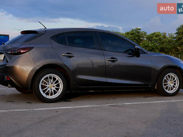 Коричневый Мазда 3, объемом двигателя 2 л и пробегом 196 тыс. км за 9000 $, фото 6 на Automoto.ua