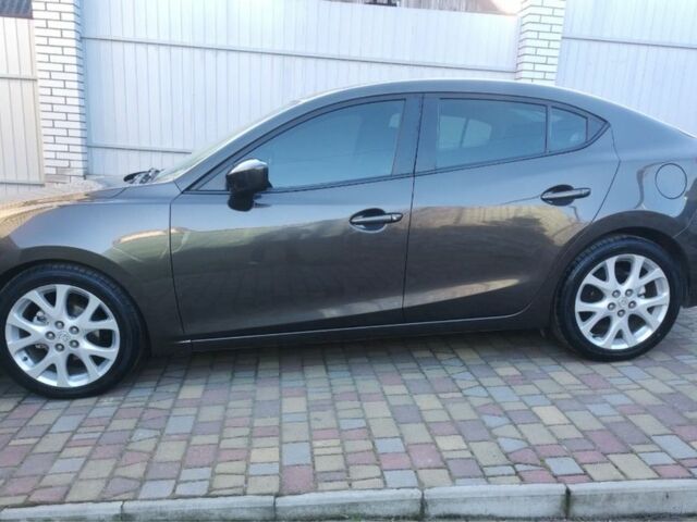 Коричневый Мазда 3, объемом двигателя 2 л и пробегом 180 тыс. км за 8999 $, фото 1 на Automoto.ua