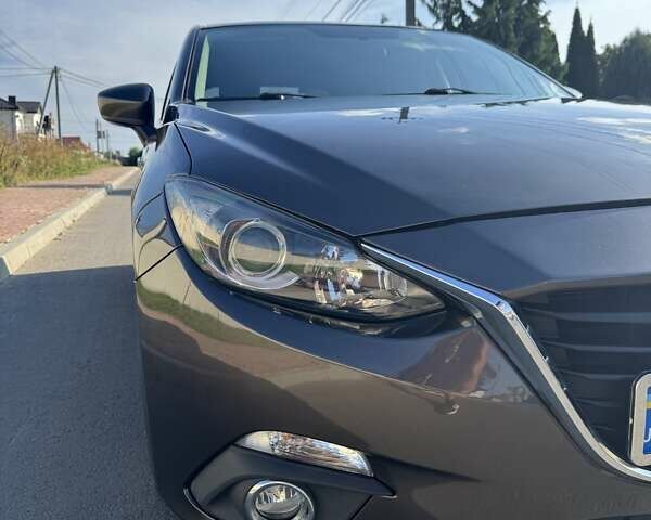 Коричневый Мазда 3, объемом двигателя 2 л и пробегом 190 тыс. км за 9700 $, фото 6 на Automoto.ua