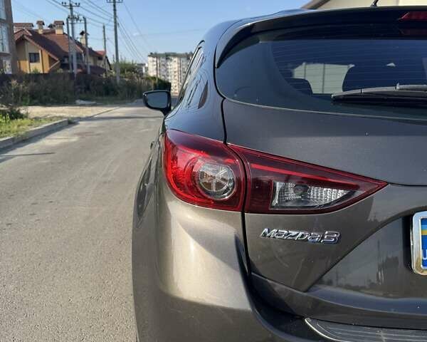 Коричневый Мазда 3, объемом двигателя 2 л и пробегом 190 тыс. км за 9700 $, фото 17 на Automoto.ua