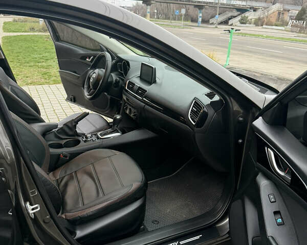 Коричневый Мазда 3, объемом двигателя 2 л и пробегом 192 тыс. км за 10000 $, фото 11 на Automoto.ua