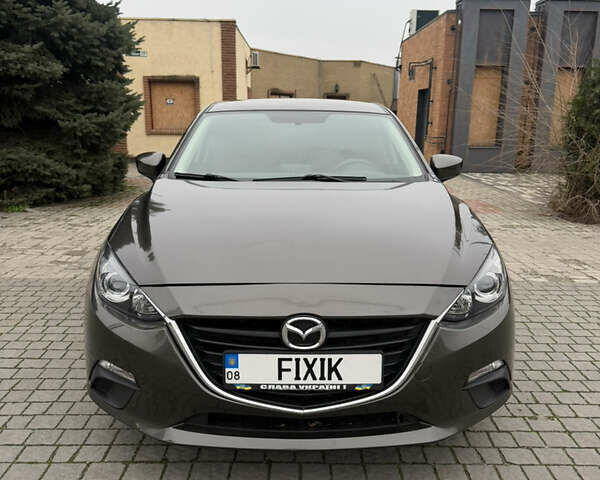 Коричневый Мазда 3, объемом двигателя 2 л и пробегом 192 тыс. км за 10000 $, фото 1 на Automoto.ua