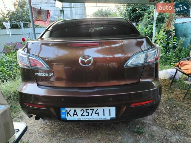 Коричневий Мазда 3, об'ємом двигуна 1.6 л та пробігом 65 тис. км за 9500 $, фото 30 на Automoto.ua