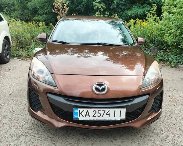 Коричневий Мазда 3, об'ємом двигуна 1.6 л та пробігом 65 тис. км за 9500 $, фото 4 на Automoto.ua