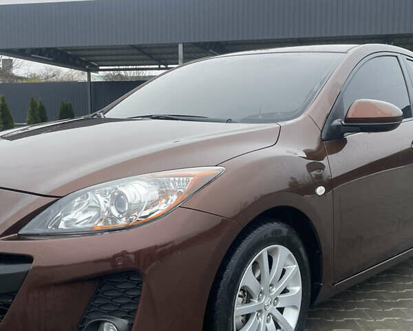 Коричневый Мазда 3, объемом двигателя 1.56 л и пробегом 197 тыс. км за 6800 $, фото 5 на Automoto.ua