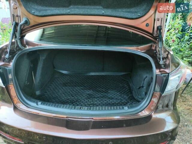 Коричневий Мазда 3, об'ємом двигуна 1.6 л та пробігом 65 тис. км за 9500 $, фото 28 на Automoto.ua