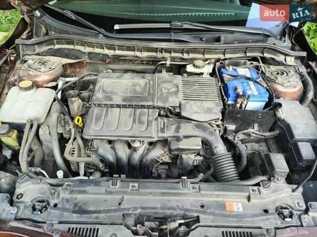 Коричневий Мазда 3, об'ємом двигуна 1.6 л та пробігом 65 тис. км за 9500 $, фото 26 на Automoto.ua