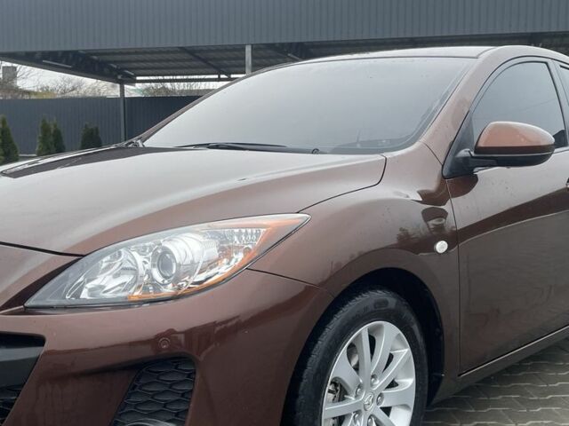 Коричневый Мазда 3, объемом двигателя 1.6 л и пробегом 197 тыс. км за 6800 $, фото 3 на Automoto.ua