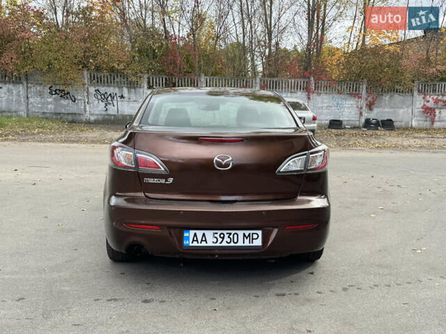 Коричневый Мазда 3, объемом двигателя 1.6 л и пробегом 136 тыс. км за 8300 $, фото 10 на Automoto.ua
