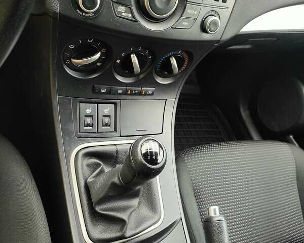 Коричневий Мазда 3, об'ємом двигуна 1.6 л та пробігом 65 тис. км за 9500 $, фото 11 на Automoto.ua