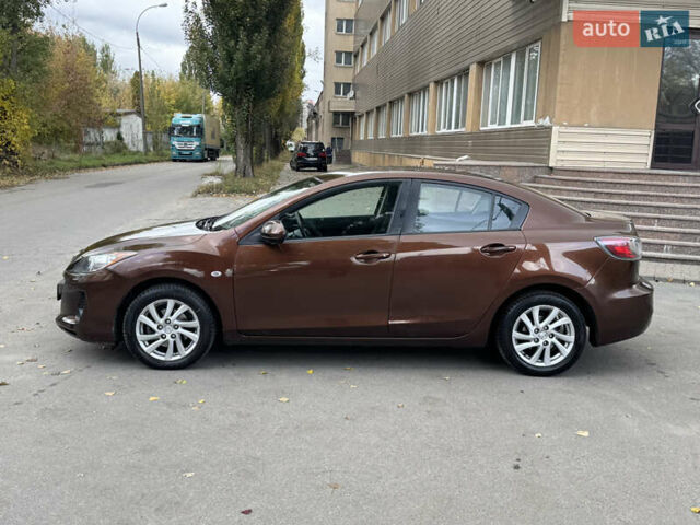 Коричневый Мазда 3, объемом двигателя 1.6 л и пробегом 136 тыс. км за 8300 $, фото 7 на Automoto.ua