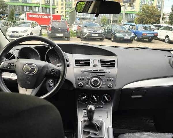 Коричневий Мазда 3, об'ємом двигуна 1.6 л та пробігом 65 тис. км за 9500 $, фото 18 на Automoto.ua