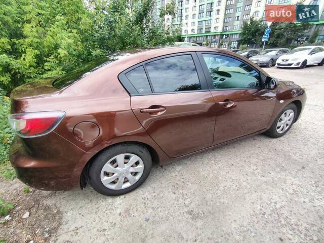 Коричневий Мазда 3, об'ємом двигуна 1.6 л та пробігом 65 тис. км за 9500 $, фото 3 на Automoto.ua