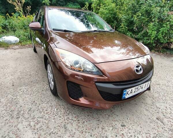 Коричневий Мазда 3, об'ємом двигуна 1.6 л та пробігом 65 тис. км за 9500 $, фото 5 на Automoto.ua