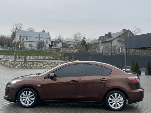 Коричневый Мазда 3, объемом двигателя 1.6 л и пробегом 197 тыс. км за 6800 $, фото 2 на Automoto.ua