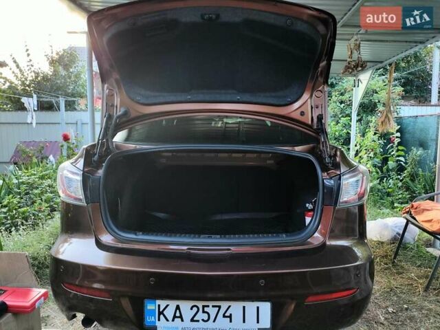 Коричневий Мазда 3, об'ємом двигуна 1.6 л та пробігом 65 тис. км за 9500 $, фото 29 на Automoto.ua