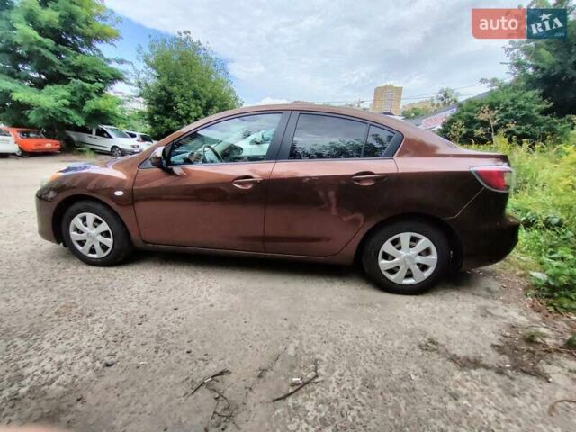 Коричневий Мазда 3, об'ємом двигуна 1.6 л та пробігом 65 тис. км за 9500 $, фото 1 на Automoto.ua