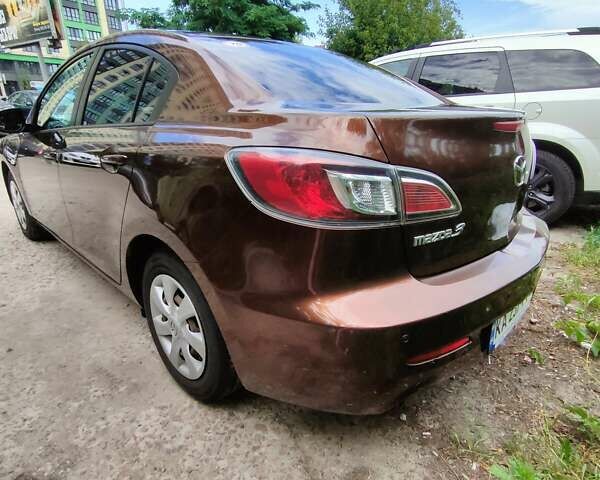 Коричневий Мазда 3, об'ємом двигуна 1.6 л та пробігом 65 тис. км за 9500 $, фото 7 на Automoto.ua