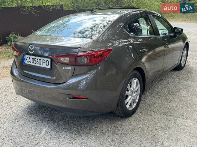 Коричневый Мазда 3, объемом двигателя 2 л и пробегом 135 тыс. км за 10950 $, фото 3 на Automoto.ua