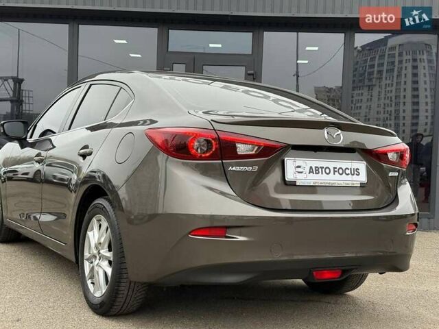 Коричневий Мазда 3, об'ємом двигуна 1.5 л та пробігом 246 тис. км за 11690 $, фото 8 на Automoto.ua
