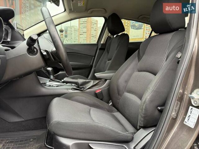 Коричневий Мазда 3, об'ємом двигуна 1.5 л та пробігом 246 тис. км за 11690 $, фото 7 на Automoto.ua