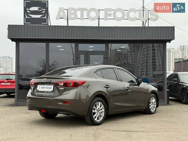 Коричневий Мазда 3, об'ємом двигуна 1.5 л та пробігом 246 тис. км за 11690 $, фото 3 на Automoto.ua