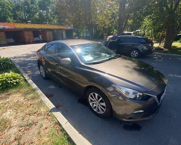 Коричневый Мазда 3, объемом двигателя 2 л и пробегом 125 тыс. км за 9800 $, фото 1 на Automoto.ua