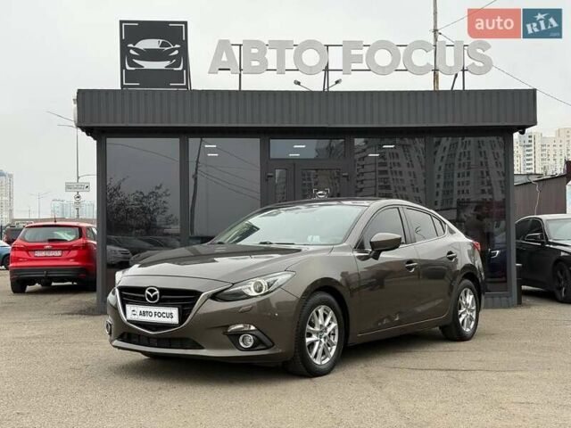 Коричневий Мазда 3, об'ємом двигуна 1.5 л та пробігом 246 тис. км за 11690 $, фото 4 на Automoto.ua