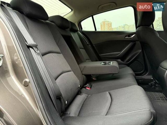 Коричневий Мазда 3, об'ємом двигуна 1.5 л та пробігом 246 тис. км за 11690 $, фото 10 на Automoto.ua