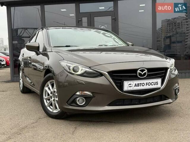 Коричневий Мазда 3, об'ємом двигуна 1.5 л та пробігом 246 тис. км за 11690 $, фото 1 на Automoto.ua