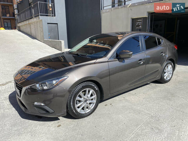 Коричневый Мазда 3, объемом двигателя 2 л и пробегом 171 тыс. км за 11500 $, фото 1 на Automoto.ua