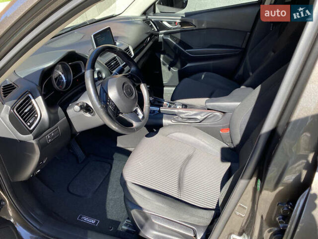 Коричневый Мазда 3, объемом двигателя 2 л и пробегом 171 тыс. км за 11500 $, фото 9 на Automoto.ua