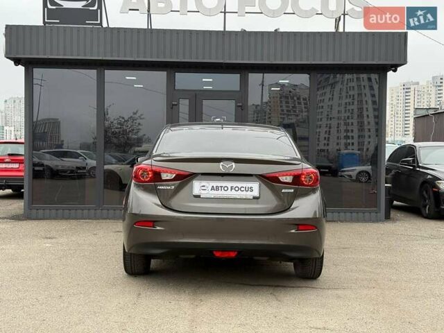 Коричневий Мазда 3, об'ємом двигуна 1.5 л та пробігом 246 тис. км за 11690 $, фото 5 на Automoto.ua