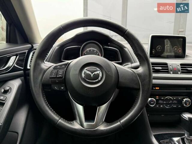 Коричневий Мазда 3, об'ємом двигуна 1.5 л та пробігом 246 тис. км за 11690 $, фото 14 на Automoto.ua