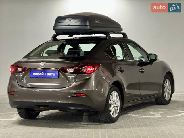Мазда 3 2014 в Киеве на Automoto.ua Коричневый Мазда 3, объемом двигателя 2 л и пробегом 111 тыс. км за 9999 $, фото 4 на Automoto.ua