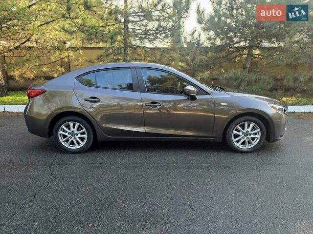 Коричневый Мазда 3, объемом двигателя 2 л и пробегом 175 тыс. км за 10400 $, фото 3 на Automoto.ua