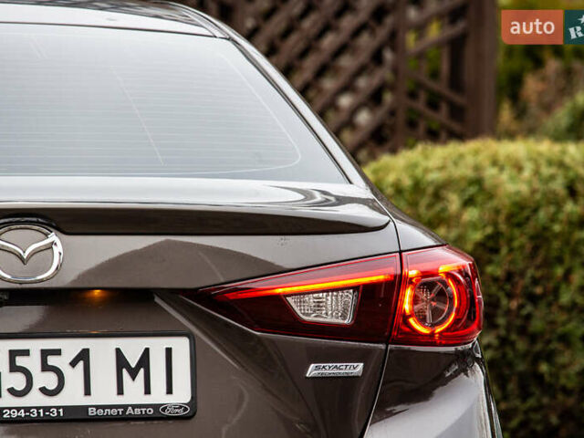 Коричневый Мазда 3, объемом двигателя 1.5 л и пробегом 181 тыс. км за 10500 $, фото 17 на Automoto.ua