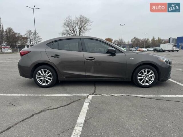 Коричневый Мазда 3, объемом двигателя 2 л и пробегом 175 тыс. км за 9999 $, фото 3 на Automoto.ua