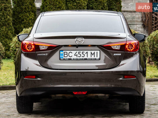 Коричневый Мазда 3, объемом двигателя 1.5 л и пробегом 181 тыс. км за 10500 $, фото 15 на Automoto.ua