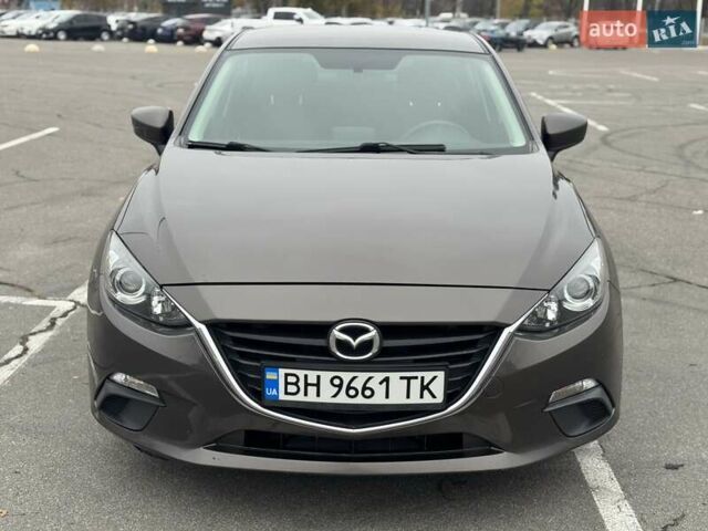 Коричневый Мазда 3, объемом двигателя 2 л и пробегом 175 тыс. км за 9999 $, фото 1 на Automoto.ua