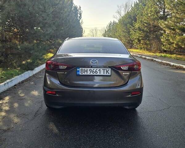 Коричневый Мазда 3, объемом двигателя 2 л и пробегом 175 тыс. км за 10400 $, фото 5 на Automoto.ua