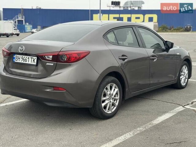 Коричневый Мазда 3, объемом двигателя 2 л и пробегом 175 тыс. км за 9999 $, фото 4 на Automoto.ua