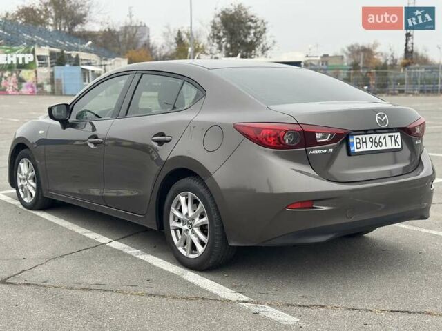 Коричневый Мазда 3, объемом двигателя 2 л и пробегом 175 тыс. км за 9999 $, фото 6 на Automoto.ua
