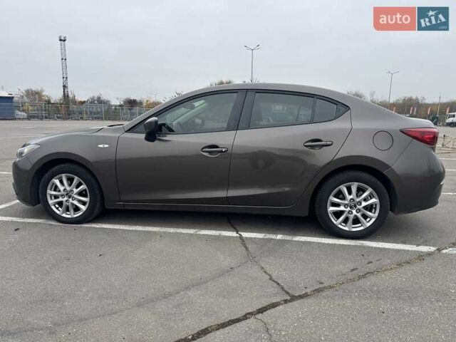 Коричневый Мазда 3, объемом двигателя 2 л и пробегом 175 тыс. км за 9999 $, фото 7 на Automoto.ua