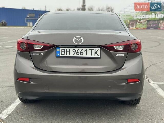 Коричневый Мазда 3, объемом двигателя 2 л и пробегом 175 тыс. км за 9999 $, фото 5 на Automoto.ua